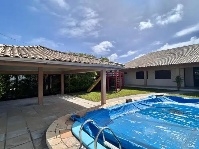 Casa / Sobrado para Locação em Xangri Lá/RS Centro 4 Quartos