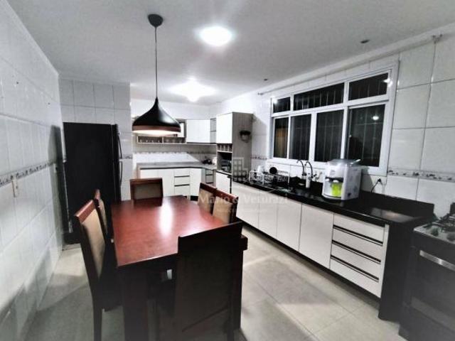 Casa sobreposta térrea com 3 dormitórios à venda por R$ 700.000,00 Vila Santa Rosa Guarujá/SP
