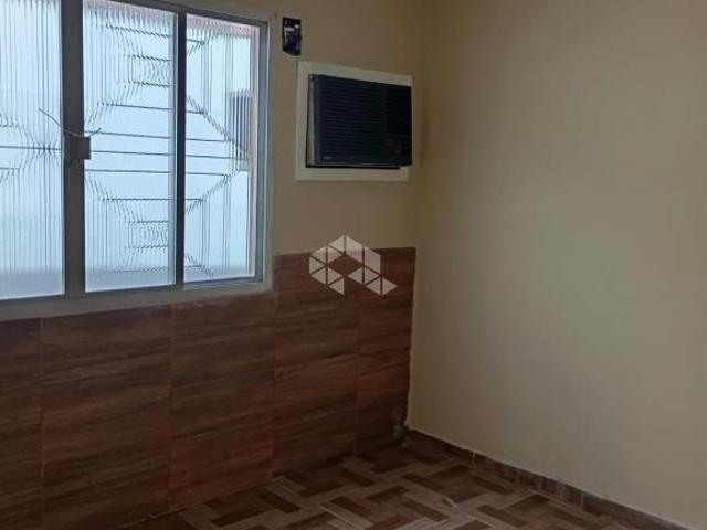 Casa térrea totalmente reformada no bairro Harmonia, Canoas, e terreno medindo 1