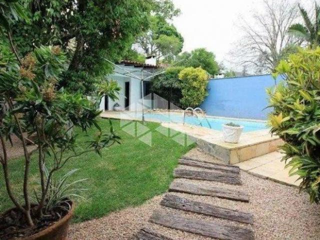 Casa térrea com 3 dormitórios no bairro Jardim Isabel em Porto Alegre