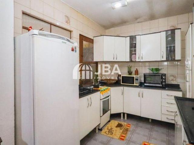 Casa Térrea com Edícula e terreno nos fundos