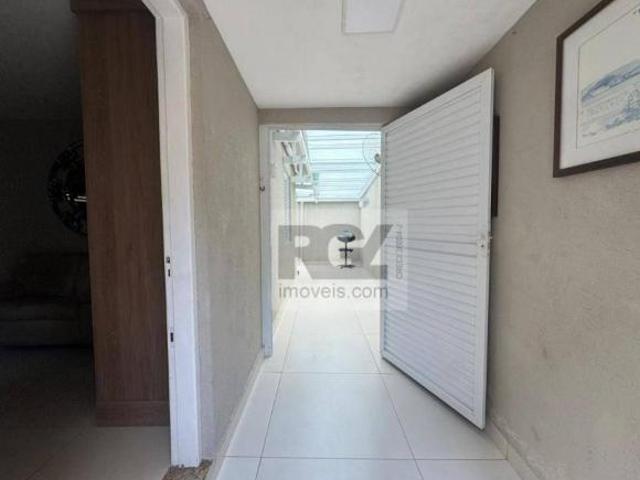 CASA TÉRREA COM QUINTAL REFORMADA, 80 m² por R$ 845.000 Ponta da Praia Santos/SP