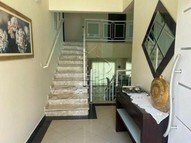 CASA TERREA EM CONDOMINIO COM 4 SUITES SENDO 1 CLOSET GRANJA OLGA III