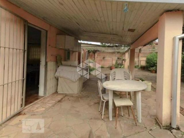 Casa,Terreno medindo 13 M² de frente por 77 M² de frente a fundos no bairro Partenon em Porto Alegre