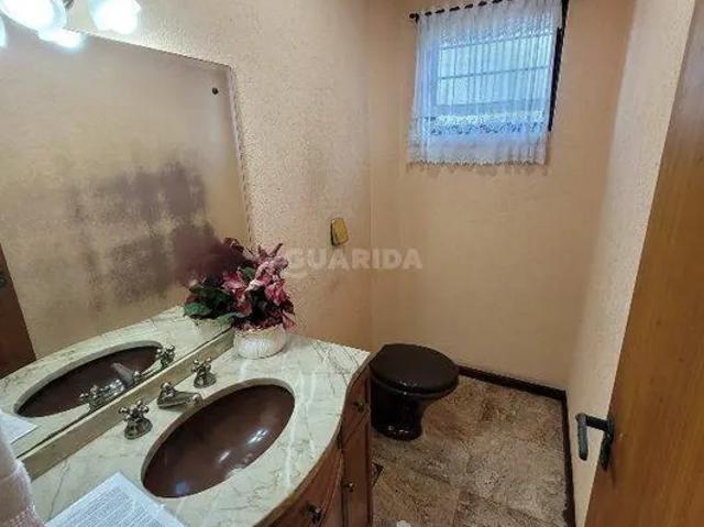 Casa totalmente mobiliada de 3 dormitórios, sendo 1 suíte, no bairro Jardim Botânico
