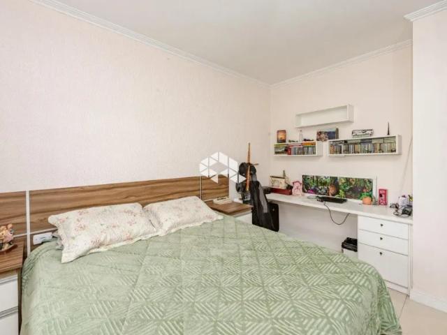 Casa à venda no Bairro Bela Vista em Canoas 4 dormitórios, suíte máster, área gourmet, pátio amplo