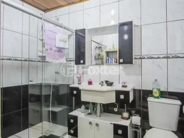 Casa à venda Avenida João Antônio Silveira, Restinga Porto Alegre