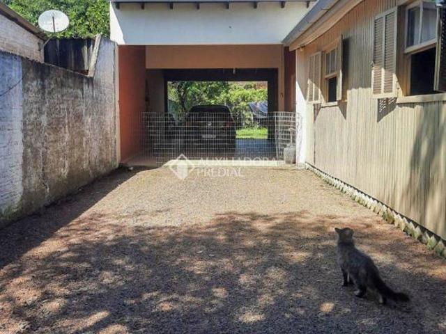 Casa 03 dormitórios com amplo terreno