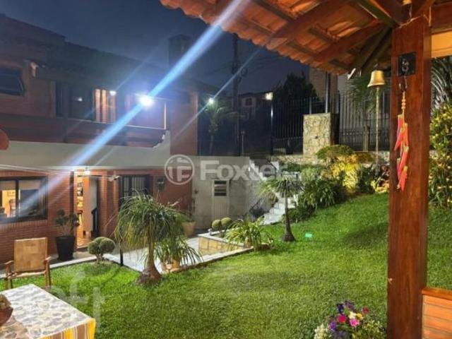 Casa, 3 dormitórios, 229.7 m², em Cinqüentenário
