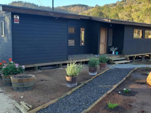 Casa 3 dormitorios,2 baños,terreno 5000m2
