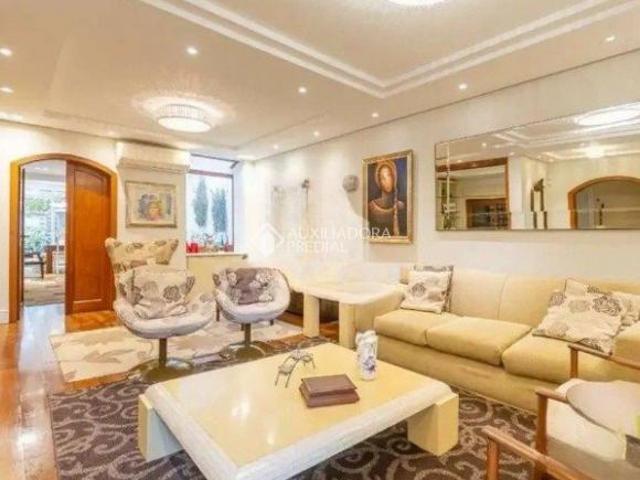 casa 3 dormitórios 326m2 privativos 7 vagas de garagem no bairro Tristeza