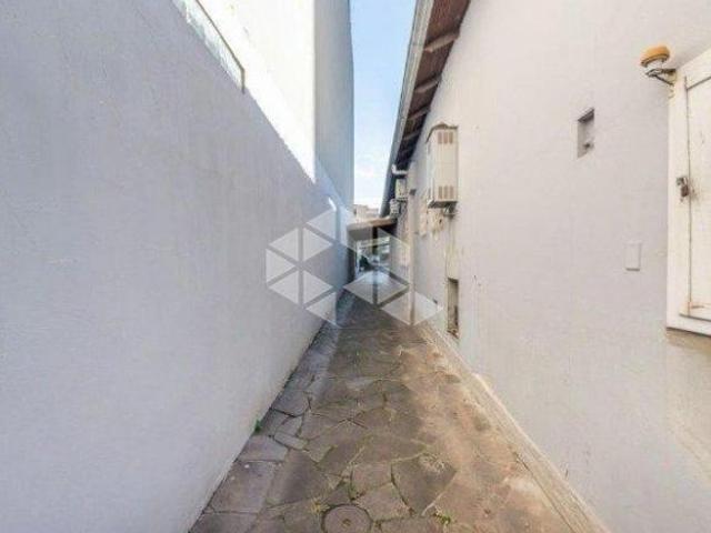 Casa 3 dormitórios com garagem no bairro Cidade Baixa em Porto Alegre