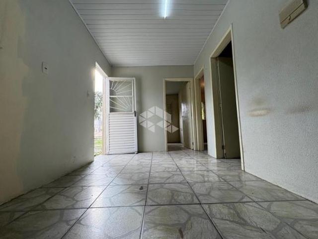 Casa 3 dormitórios com pátio no Bairro Urlândia