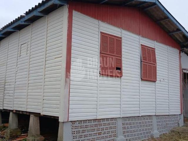 Casa 3 dormitórios em madeira com amplo pátio na morada do Vale I em Gravatai.Aceito casa na praia o