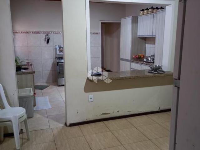 Casa 3 dormitórios, terreno amplo para uso fins comerciais ou residenciais para venda no bairro Rio