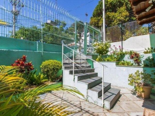 CASA 4 DORM NO BAIRRO PARTENON EM PORTO ALEGRE