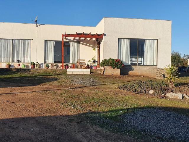 CASA 4 DORMITORIOS,2 BAÑOS,ROL PROPIO,AGUA Y LUZ