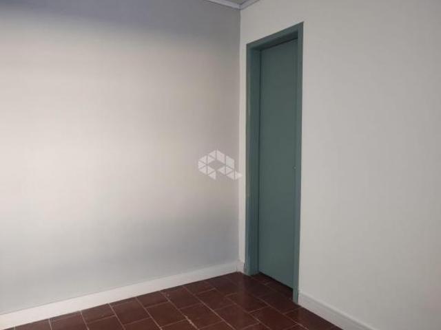 Casa 4 dormitórios. compátio, bairro São Luiz Canoas