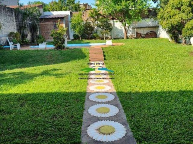 CASA 4 DORMITÓRIOS CENTRO PISCINA TERRENO 770M²