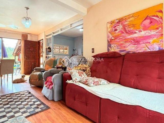 casa 4 dormitórios em condomínio no Teresópolis, com amplo pátio