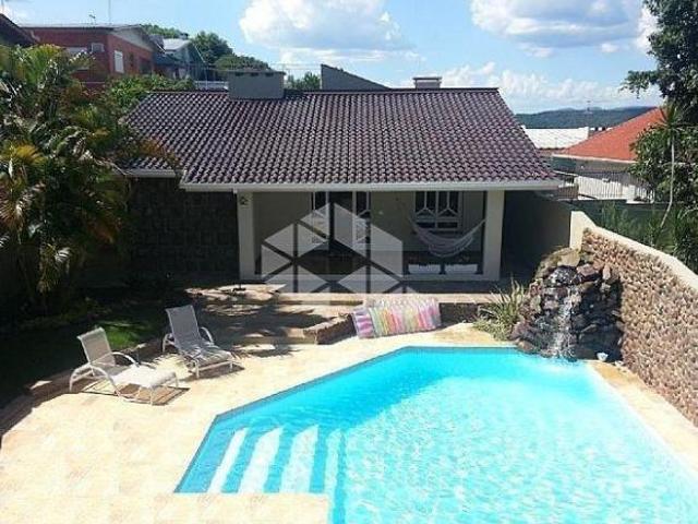 Casa 4 dormitórios, piscina no Bairro Primavera em Novo Hamburgo