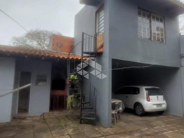 Casa 4 dormitórios Zona Sul de Porto Alegre