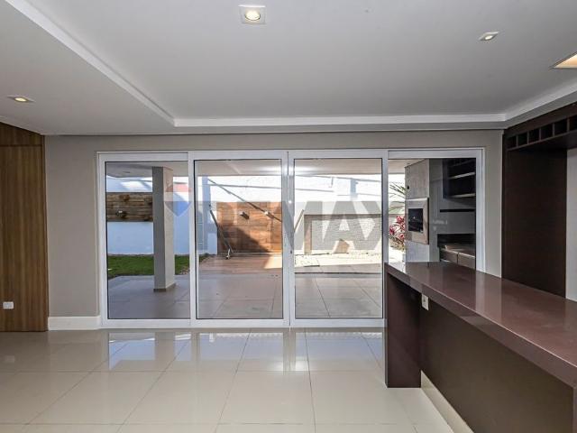 CASA 4 QUARTOS ALTO PADRÃO COM JARDIM ESPAÇO GOURMET EM CONDOMINIO SEGURO