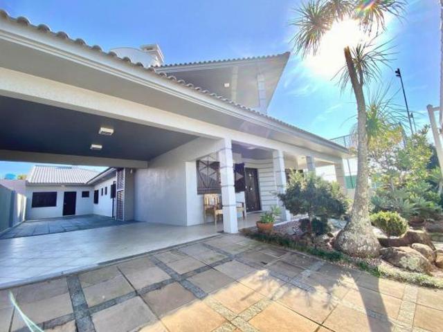 Casa 5 suítes mobiliada e decorada piscina 312m² terreno 1.403m² Atlântida Xangri Lá/RS