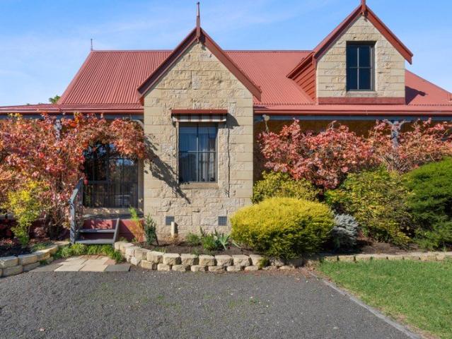 Cathedral Ceilings, Cottage Charm & Central Convenience