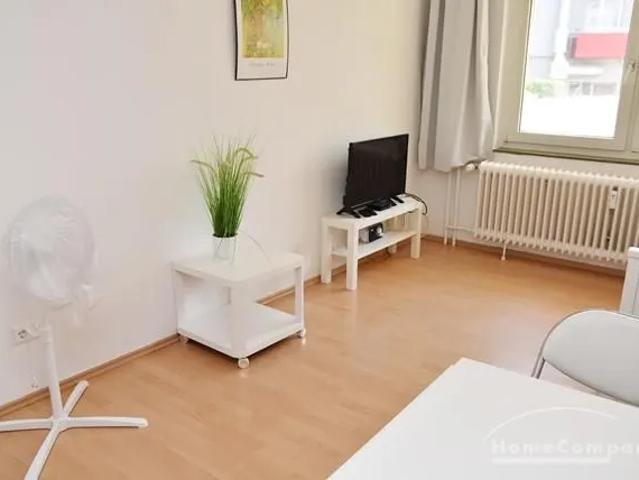 Center, Modern furnished apartment on groundfloor, centrally located