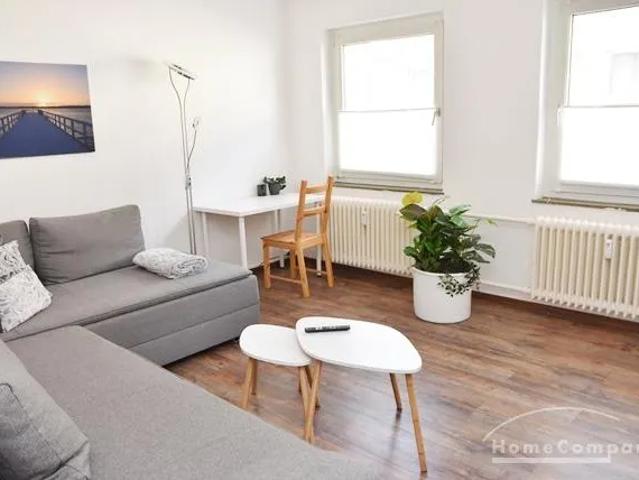 Center, Modern furnished apartment with balcony on the 1st floor in a central location