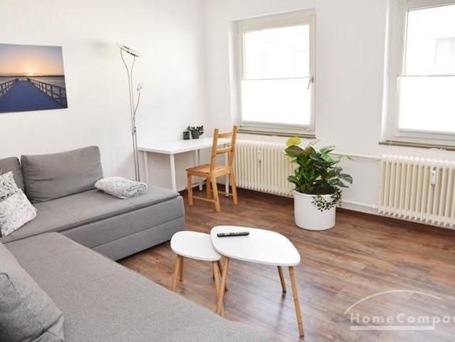 Center, Modern furnished apartment with balcony on the 1st floor in a central location