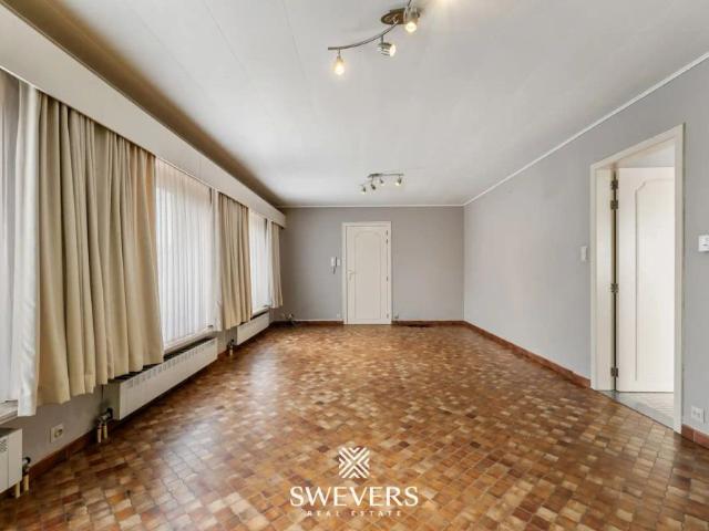 Centraal gelegen drieslaapkamer appartement