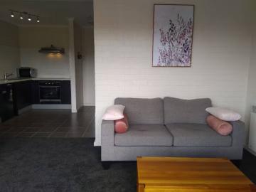 Central, modern, and convenient flat with undercover parking