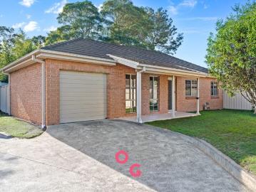 Central Convenience with Easy Care Living