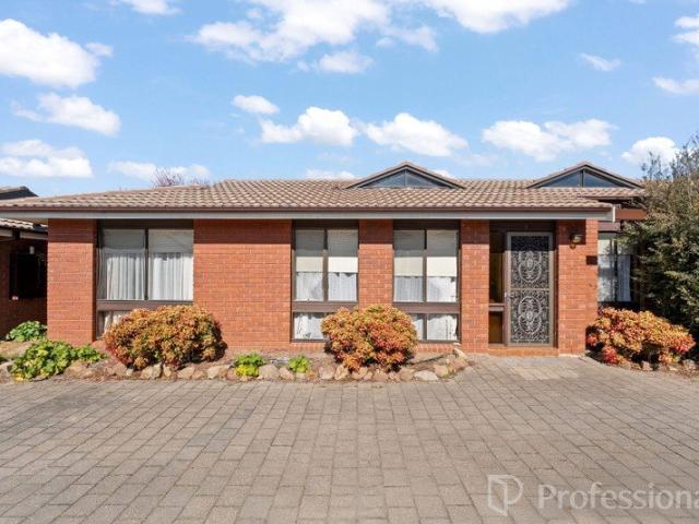 CENTRAL CONVENIENCE WITH LOW MAINTENANCE APPEAL