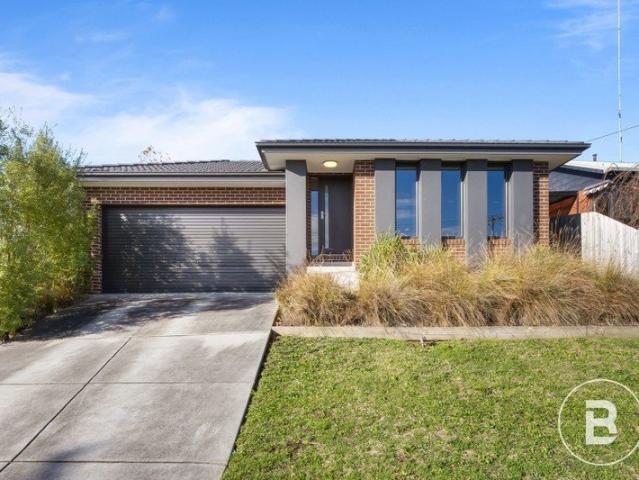 CENTRAL FOUR BEDROOM HOME AWAITS!