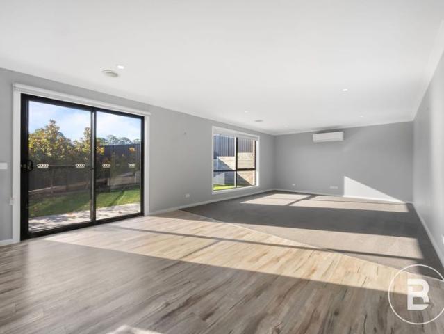 CENTRAL FOUR BEDROOM HOME AWAITS!