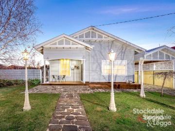 Central Hamptons Elegance with Poolside Entertaining & Versatile Family Living