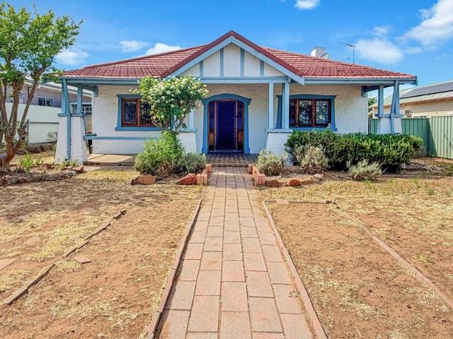 CENTRAL LOCATION GREAT RENOVATION OPPORTUNITY