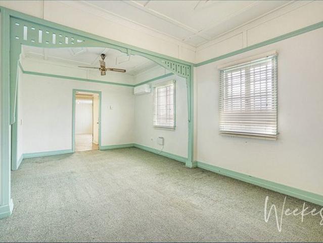 CENTRAL LOCATION, SHED SPACE & LARGE YARD!