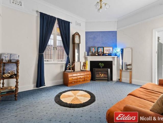 CENTRAL LOCATION WITH OFF STREET PARKING!