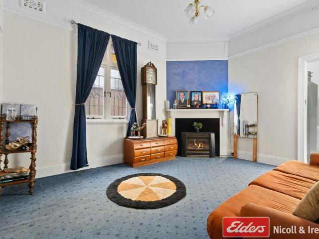 CENTRAL LOCATION WITH OFF STREET PARKING!