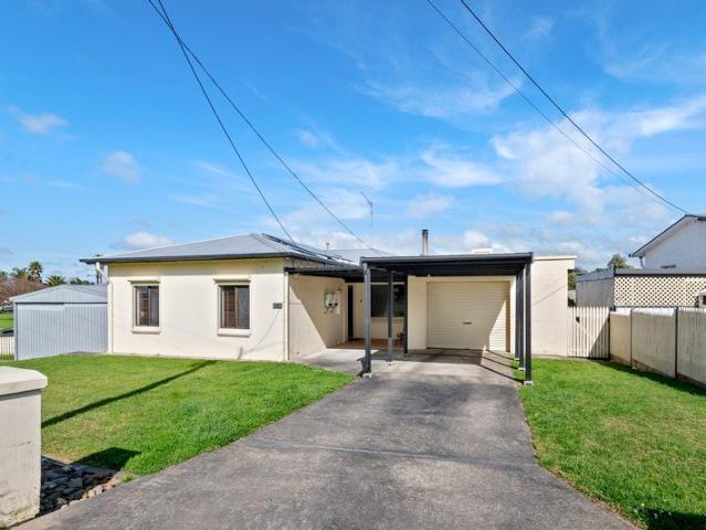 Central, low maintenance, comfortable home