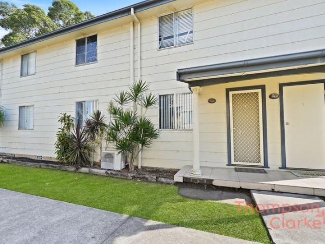 CENTRAL, LOW MAINTENANCE & READY TO MOVE IN