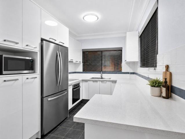 Central to the CBD with parking for two