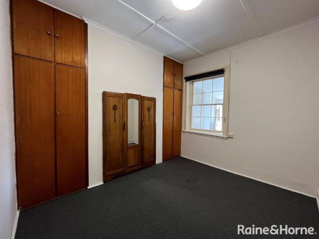 Central To Town Upstairs Unit