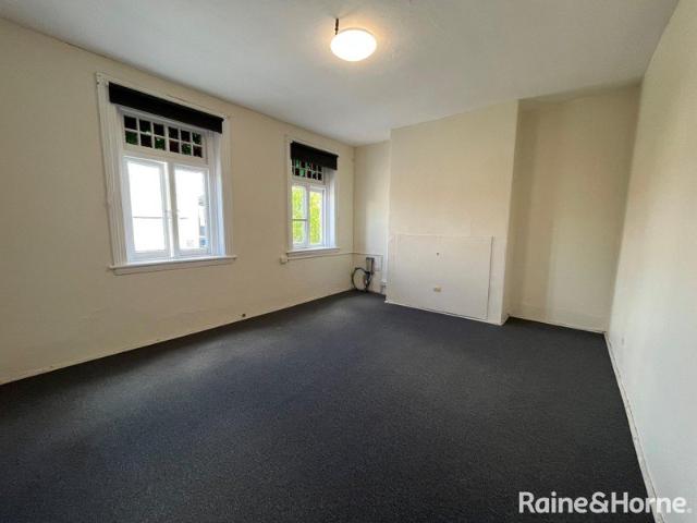 Central To Town Upstairs Unit