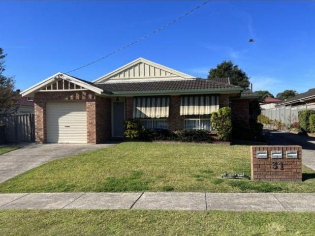 Centrally located 2 bedroom villa with single car garage