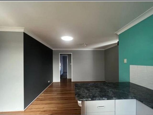 Centrally located 2 bedroom villa with single car garage